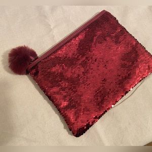 Red sparkly clutch